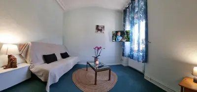 Un ou plusieurs lits dans un hébergement de l'établissement Gite Fougère 2 à 6 personnes avec SPA et salle de jeux dans la résidence