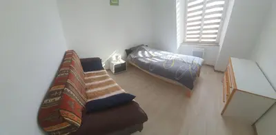 Un ou plusieurs lits dans un hébergement de l'établissement Cramiland - Super appart 5 pers centre ville