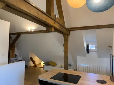 Un ou plusieurs lits dans un hébergement de l'établissement Le Loft