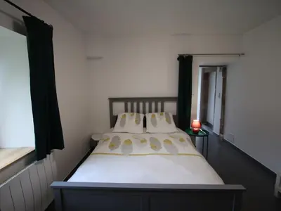 Un ou plusieurs lits dans un hébergement de l'établissement Charmant gîte en montagne, 3 étoiles, proche randonnées et Alsace, tout confort avec terrasse. - FR-1-589-391