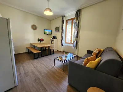 Coin salon dans l'établissement Gîte Jonquille, 2 à 8 personnes avec salle de jeux et SPA dans la résidence