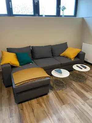 Coin salon dans l'établissement Charmant logement avec balnéo