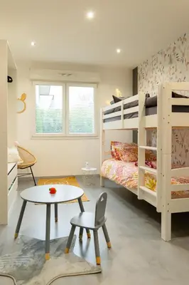 Un ou plusieurs lits dans un hébergement de l'établissement La Villetta G Riedisheim - appartement de Standing