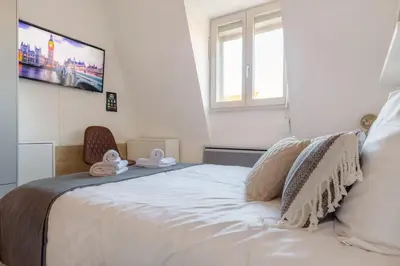 Un ou plusieurs lits dans un hébergement de l'établissement Travel Homes - The Trifel, 2min walk Little Venice