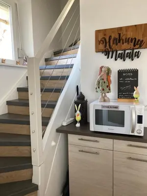 Cuisine ou kitchenette dans l'établissement Au passe temps