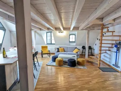 Coin salon dans l'établissement Appartement Le Ch'ti Alsacien
