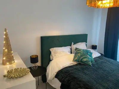 Un ou plusieurs lits dans un hébergement de l'établissement Le Grand DOLLFUS, 90m2 de charme au coeur de ville