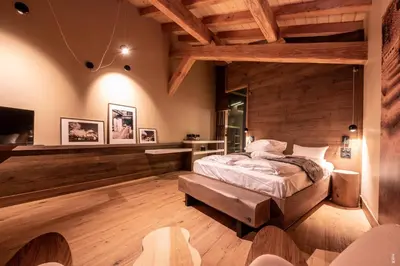 Un ou plusieurs lits dans un hébergement de l'établissement Chalet Hôtel & Spa Le Collet