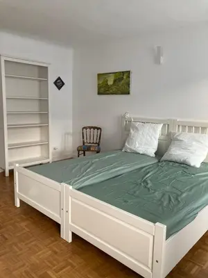 Un ou plusieurs lits dans un hébergement de l'établissement TANGO appartement de charme calme 75m2 6 pers,2 chambres,patio