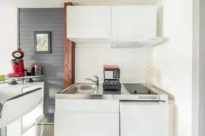 Cuisine ou kitchenette dans l'établissement StuDio 11 - Centre-ville - Cozy