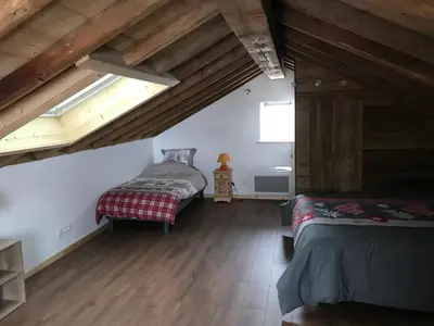 Un ou plusieurs lits dans un hébergement de l'établissement Le Duplex