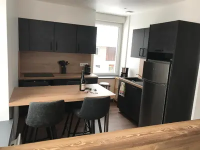 Cuisine ou kitchenette dans l'établissement Le Duplex