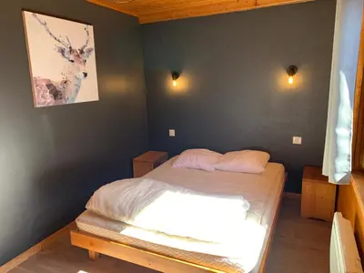 Un ou plusieurs lits dans un hébergement de l'établissement Chalet Gaby - chalet atypique avec SPA