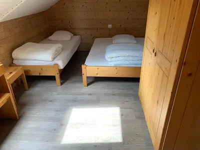 Un ou plusieurs lits dans un hébergement de l'établissement Chalet Gaby - chalet atypique avec SPA