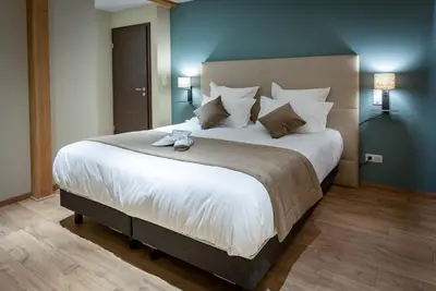 Un ou plusieurs lits dans un hébergement de l'établissement SERENITY Colmar - Gîtes de Prestige 4 et 5 étoiles - 2, 4 et 6 personnes- Centre Historique