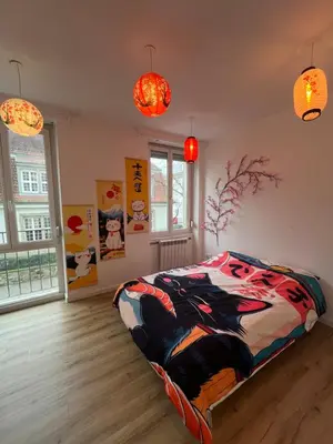 Un ou plusieurs lits dans un hébergement de l'établissement Le 10 - Studio Tokyo, tout équipé Mulhouse centre - stationnement gratuit