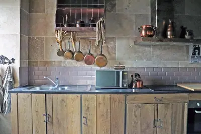 Cuisine ou kitchenette dans l'établissement Le grand gîte du Sorcier ! Logement magique