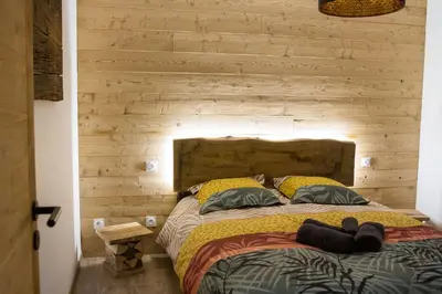Un ou plusieurs lits dans un hébergement de l'établissement Chalet de standing 9P avec sauna & salle d'escalade