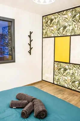 Un ou plusieurs lits dans un hébergement de l'établissement Chalet de standing 9P avec sauna & salle d'escalade