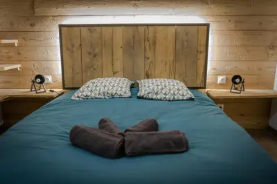 Un ou plusieurs lits dans un hébergement de l'établissement Chalet de standing 9P avec sauna & salle d'escalade