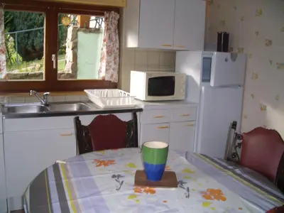 Cuisine ou kitchenette dans l'établissement Au Bon Logis
