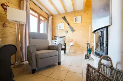 Coin salon dans l'établissement Le Refuge du Cerf