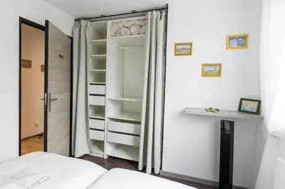 Un ou plusieurs lits dans un hébergement de l'établissement Agréable maison à la campagne
