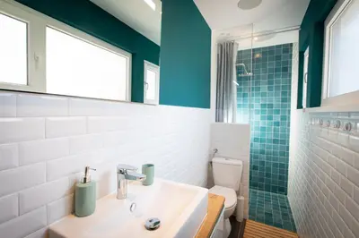 Salle de bains dans l'établissement Le Red St Léon : Lit Queen Size * WIFI * Idéal Couple