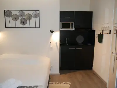 Cuisine ou kitchenette dans l'établissement Studio cosy black - Cosy & Cocon