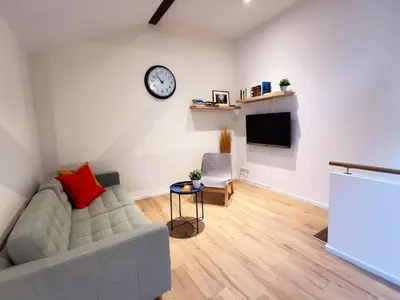Télévision ou salle de divertissement dans l'établissement Maisonnette Soultzmatt