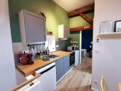 Cuisine ou kitchenette dans l'établissement Maisonnette Soultzmatt