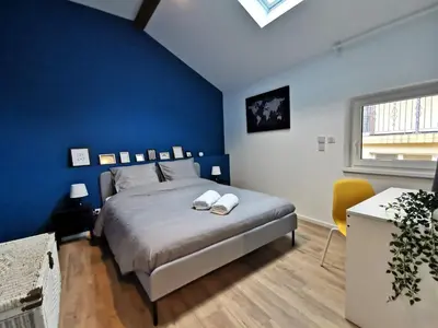 Un ou plusieurs lits dans un hébergement de l'établissement Maisonnette Soultzmatt