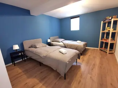 Un ou plusieurs lits dans un hébergement de l'établissement Maisonnette Soultzmatt
