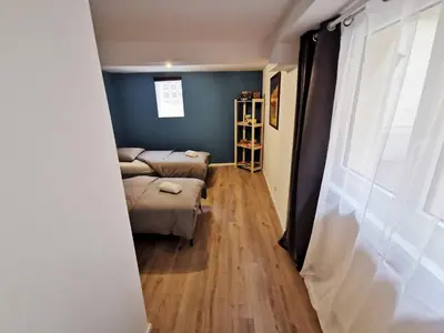 Un ou plusieurs lits dans un hébergement de l'établissement Maisonnette Soultzmatt