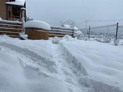 L'établissement Nouveau Gîte Bain Nordique en hiver