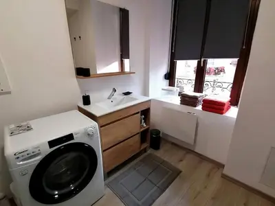 Cuisine ou kitchenette dans l'établissement LE FERRETTE - Appartement moderne et confortable