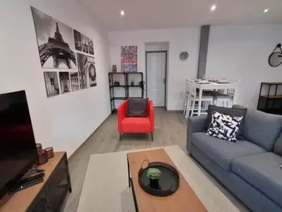 Télévision ou salle de divertissement dans l'établissement LE FERRETTE - Appartement moderne et confortable