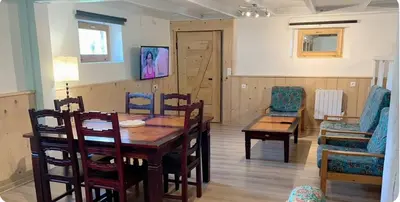 Télévision ou salle de divertissement dans l'établissement Gîte de Juliana 4 personnes