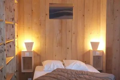 Un ou plusieurs lits dans un hébergement de l'établissement Maison familiale 3 chambres au calme dans la nature