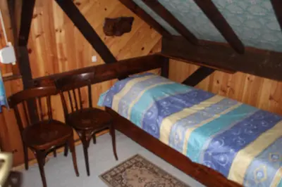 Un ou plusieurs lits dans un hébergement de l'établissement appartement mitoyen dans chalet