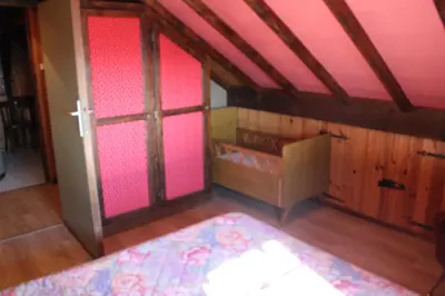 Un ou plusieurs lits dans un hébergement de l'établissement appartement mitoyen dans chalet