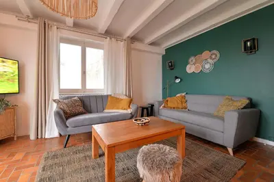 Coin salon dans l'établissement A l'Oree du Bois