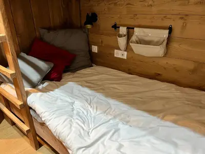 Un ou plusieurs lits dans un hébergement de l'établissement Gîte 5* piscine intérieure, sauna, à 20 mins des pistes de ski, à 300 m d’un Lac