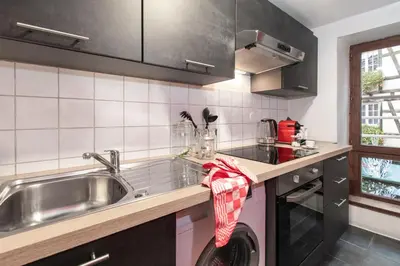 Cuisine ou kitchenette dans l'établissement Centre Ville - L'évidence - Parking