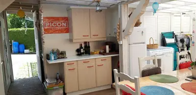 Cuisine ou kitchenette dans l'établissement Loft dans les Vosges idéal 2 personnes