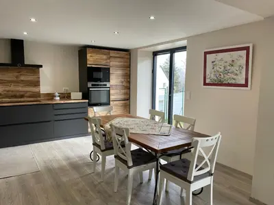 Cuisine ou kitchenette dans l'établissement Gîte Les Plains Champs