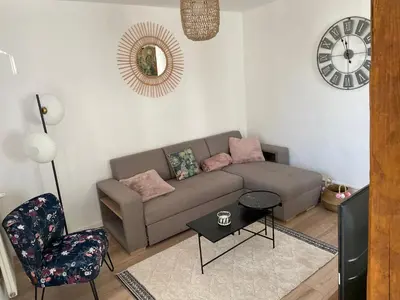 Coin salon dans l'établissement appartement le fil d'or