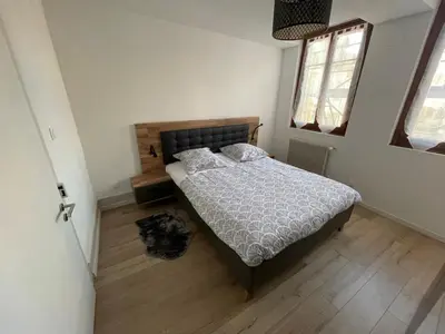 Un ou plusieurs lits dans un hébergement de l'établissement appartement le fil d'or