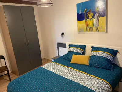 Un ou plusieurs lits dans un hébergement de l'établissement appartement le fil d'or