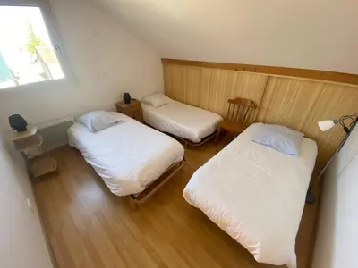 Un ou plusieurs lits dans un hébergement de l'établissement Chalet Rouge Gazon Site Naturel Classé